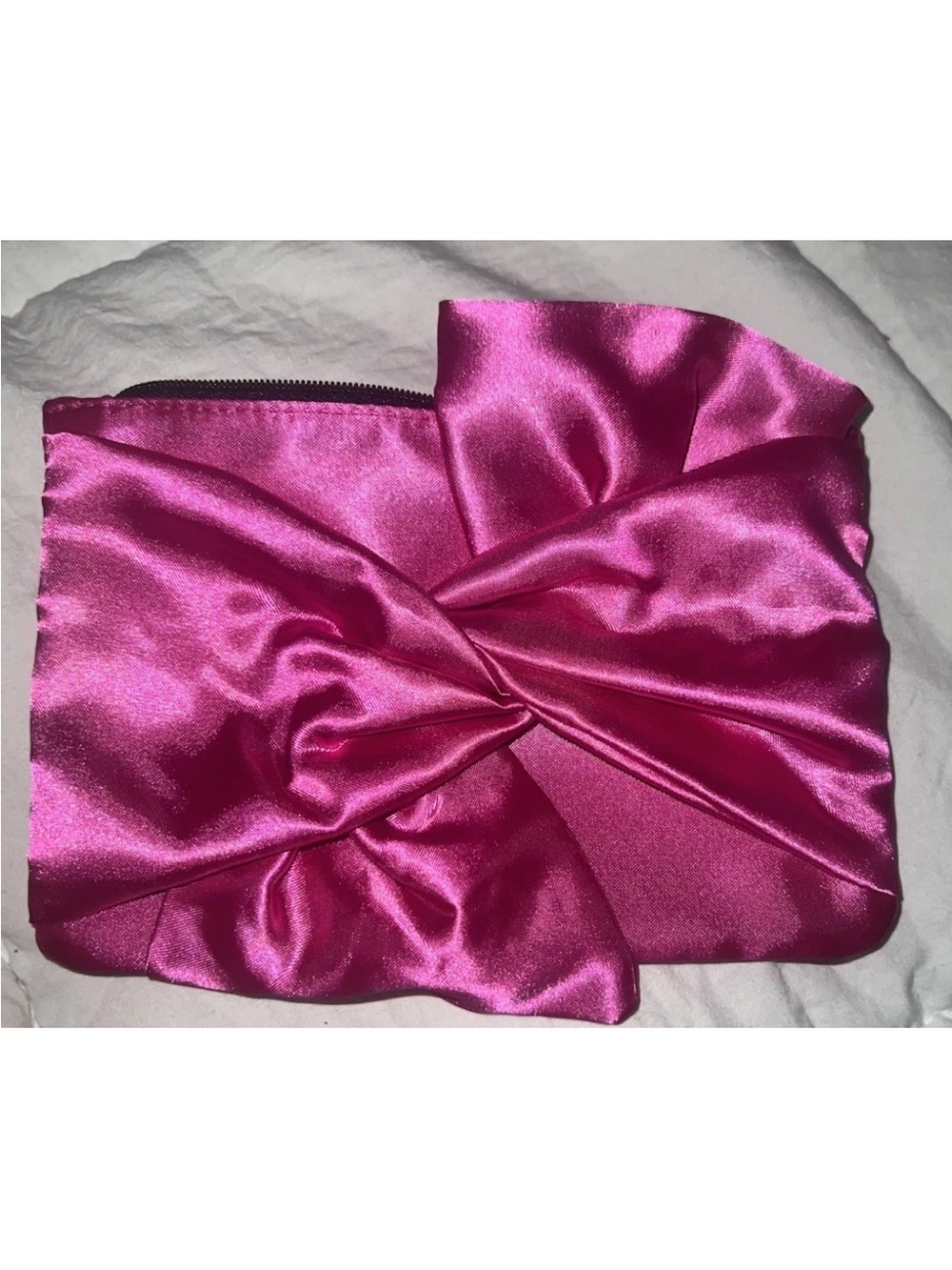 IPSY June 2026 hot pink bag with new products